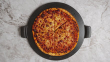 Load and play video in Gallery viewer, 14&quot; Pizza Stone with Handles. Coated with Food Grade Fire Resistant Material
