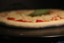 Load image into Gallery viewer, 14&quot; Pizza Stone with Handles. Coated with Food Grade Fire Resistant Material
